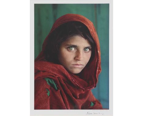 Steve McCurry (American, b.1950)Afghan Girloffset lithograph in colours, signed 'Steve McCurry' in pen l.r.image 49.3 x 32.5c