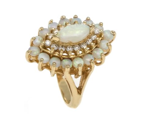 Opal-Brillant-Ring GG 585/000 mit einem navetteförmigen und 16 runden Opal-Cabochons, sowie 16 Brillanten, zus. 0,30 ct W/SI,