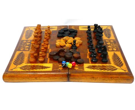 A Late XIX Century Folding Chess/Backgammon Board, with marquetry inlaid borders of leaves and shamrocks, the interior with c