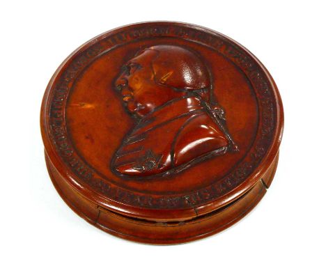 A George III Commemorative Boxwood Snuff Box, of circular form with faux tortoiseshell interior base, the screw cover with re