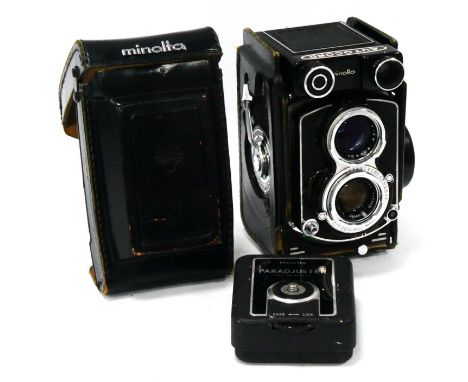 A Minolta Autocord TLR Camera 6x6 medium format, with Rokkor 1:3.5 lens, together with Minolta Paradjuster.