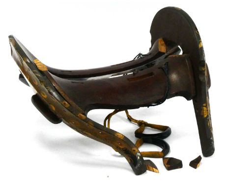 A Late XIX Century Japanese Lacquer Kura Saddle, the wood frame decorated in gold with birds amongst flowering shrubs, 37cm l