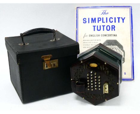 A Wheatstone and Co. Concertina, model number 21221, the fretwork end with forty-eight metal keys, paper labels, black carryi