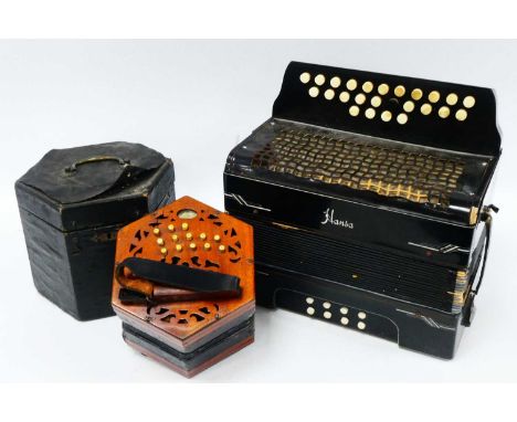 A Lachenal and Co. Concertina, with twenty-seven bone keys, paper label, boxed and a Hans accordion. (2)