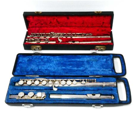 A Boosey and Hawkes 'Regent' White Metal Flute, in fitted carrying case and a Yamaha YFL 21S flute in a fitted carrying case.