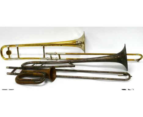 A Vintage Selmer 'Invicta' Trombone, (no keys), a Besson and Co 'Prototype' trombone and a copper bugle. (3)
