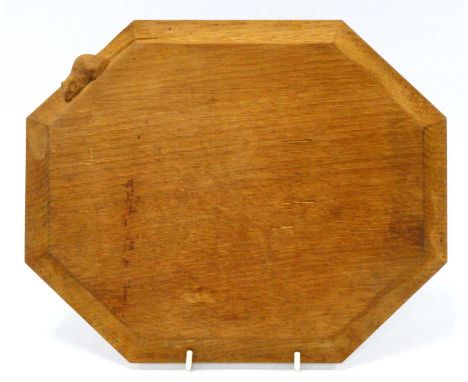 A Robert Thompson 'Mouseman' Oak Bread Board, of extended octagonal form, carved mouse signature, 24 x 31cm.