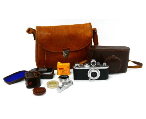 A Leica I Ernst Leitz Wetzlar DRP Camera (1942-47), No.353863 with Leitz Elmer 1:35 f-5cm lens, a Leitz Wetzlar external rang