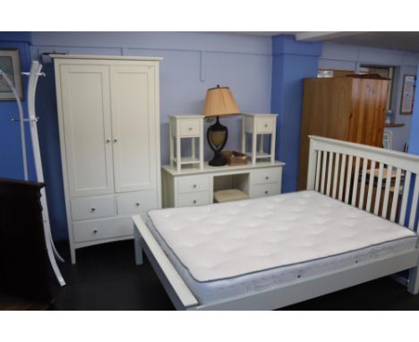 A Marks and Spencer 'Hastings' bedroom suite, comprising double bed, wardrobe, dressing table, with stool, a pair of bedside 