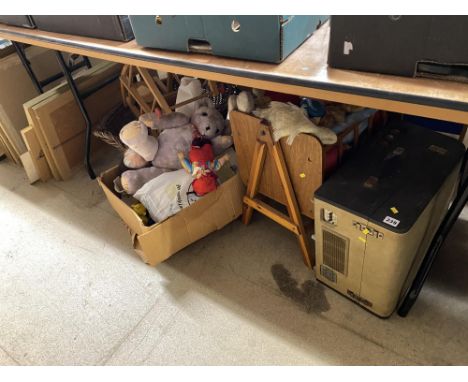 A record player and a collection of soft toys