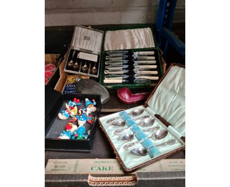 A mixed box of metalware including silver plate, boxed cutlery sets, hip flask etc. 