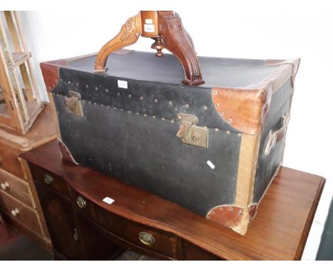 A large leather bound trunk and a vintage suitcase 