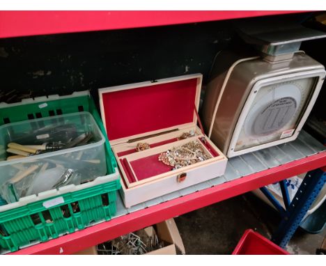 A set of vintage Avery postal scales and a box of various items including costume jewellery and cutlery. 