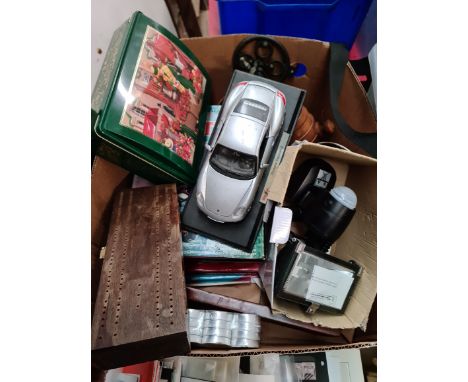 A box of misc including books, PIR light, tea lights, Dominoes and cribbage board, haberdashery swatches, etc. 