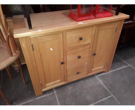 A modern light oak sideboard, width 110cm. 