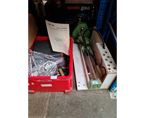 A Rexon 6" X 18" variable speed wood lathe with a box of accessories, parts, bits and related items + instruction manual. 