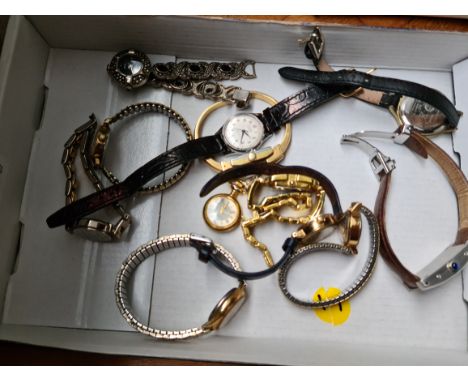 A tray containing a collection of watches, some vintage including Timex etc. 