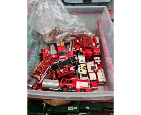 A box of fire engine toys. 