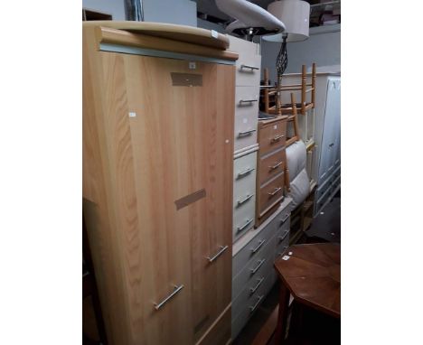 Various items of furniture; a wardrobe, a breakfast table, three bedside cabinets, a chest of drawers, a stool, two dining ch