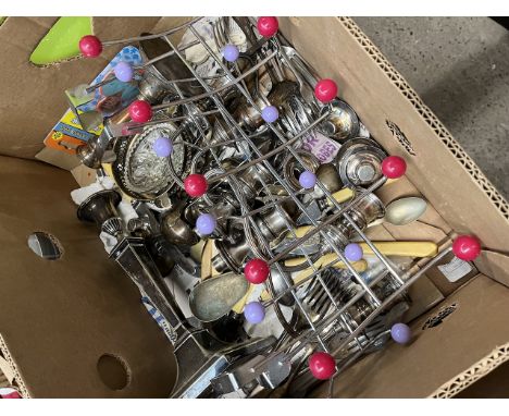 A box of plated ware to include cutlery, candlestick holders etc 