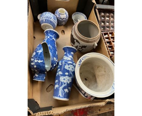 Assorted mainly Chinese porcelain comprising two blue and white prunus vases bearing Kangxi marks, a ginger jar, a rice bowl,