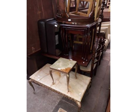 Various items of furniture; two brass and onyx tables, a nest of tables, an oak dining table, various chairs, a pouffe etc. 