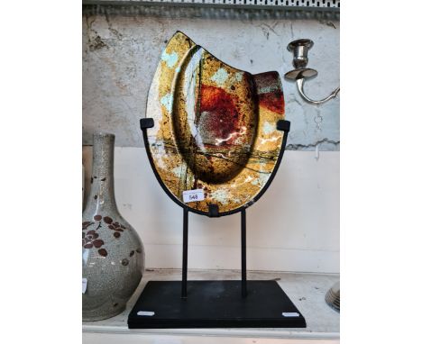 An art glass sculpture on stand, possibly Tony Evans.Height : 52 cmWidth : 29 cmCondition : various small chips on the rim, n