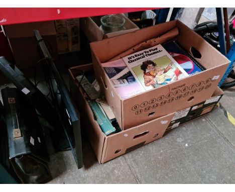3 boxes of sheet music and books, a 26" Toshiba TV - no remote, a Luxor monitor and a vintage typewriter. 