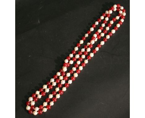 A Pearl and Garnet Bead Long Necklace