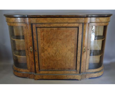 A Victorian Burr Walnut Marquetry Inlaid and Gilt Metal Mounted Credenza Cabinet with a central panelled door flanked by bow 