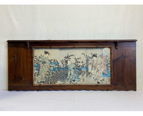 A 19th century wall mounted hardwood and bamboo shelf with a glazed panel displaying a triptych of signed Japanese possibly E