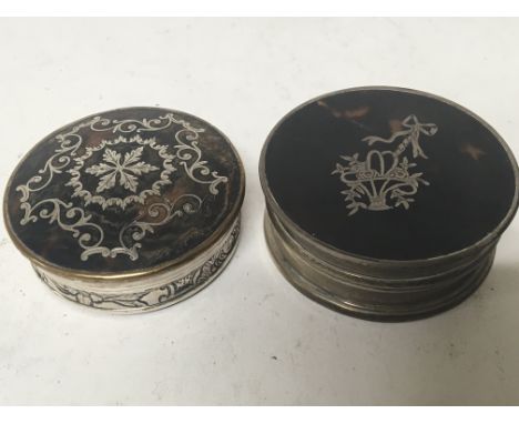 A silver and tortershell patch box and one other 19th century white metal and tortershell box (2)