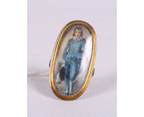 A 19th Century yellow gold ring inset with a miniature portrait of Reynolds's blue boy, size O, 5.8g