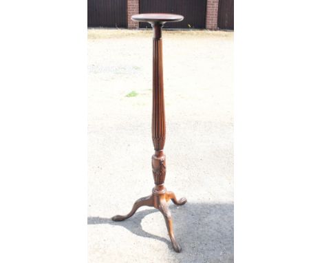 A George III mahogany reeded column torchere, on carved tripod splay supports, 55 1/2" high
