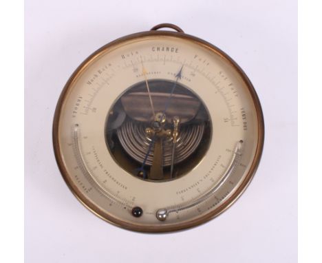 A brass cased aneroid barometer and thermometer, 6 1/2" dia
