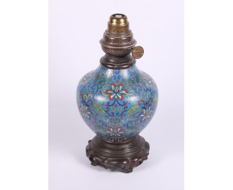 A cloisonne enamel decorated vase on bronzed base, now converted as a table lamp, 12" high