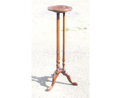 An Edwardian mahogany and box line inlaid torchere, on triple column and tripod splay supports, 39 1/2" high