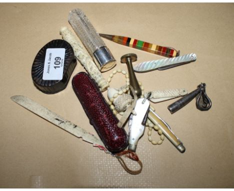 A 19th Century Chinese dragon carved ivory needlecase, an ivory acorn tape measure case, four pocket knives, various, a cigar