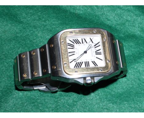 A gentleman's large size Cartier Santos 100 bi-metal automatic wristwatch with white enamel dial and Roman numerals, model nu