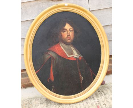 A continental 18th Century oil on canvas, portrait of an unknown gentleman, 33" x 26 1/2", in oval gilt frame