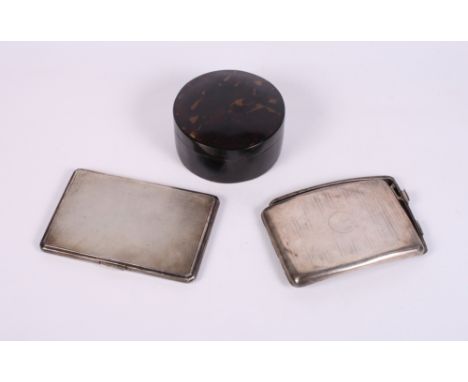 Two silver engine turned cigarette cases (one a/f), 10.8oz troy approx, and a circular tortoiseshell dressing table box