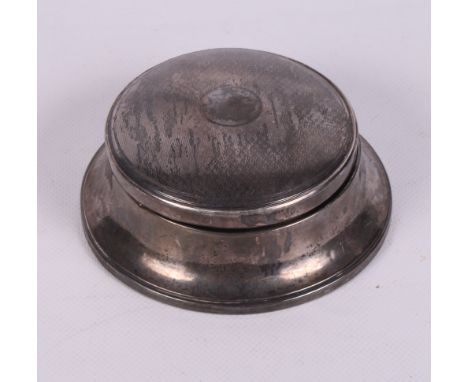 A silver engine turned circular jewel box with mirror lid