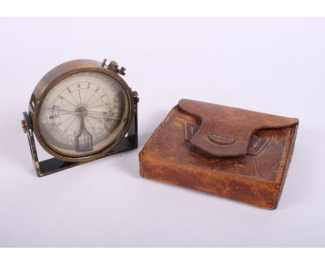 A japanned brass folding sighting compass retailed by C Baker High Holborn London, in leather travelling case