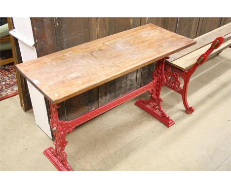 A Victorian garden bench and a garden table.