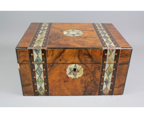 A Walnut and Mother-of-Pearl Box; the box decorated with mother-of-pearl bands and a central star to top and front, approx 30