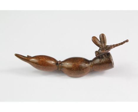 A 20th Century Cast Bronze Figurine of a Dragon Fly. The dragon depicted seated on a seed pod, approx 9 cms l.