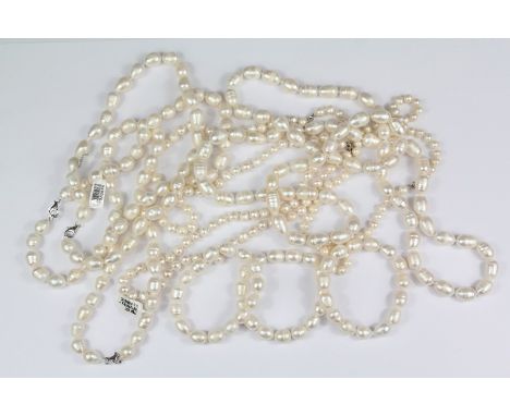 A Quantity of White Fresh Water Pearl Necklaces: three with rhodium Sterling silver clasps, 3 x 42 cms, pearls dia approx 7 m