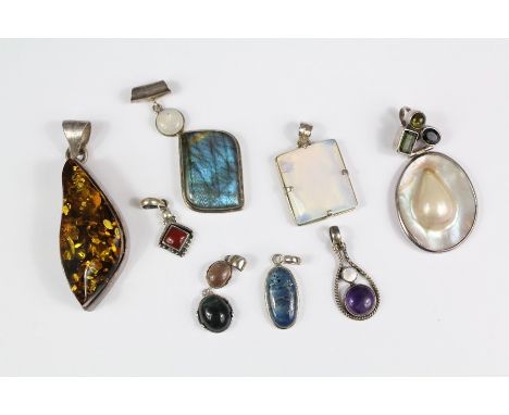 Collection of Semi-Precious Stone and Other Pendants in silver mounts, including Pearl, Quartz etc (8)