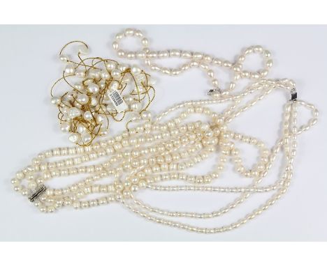 White Fresh Water Pearl Necklaces; a three strand pearl necklace, pearls approx 8 mms, approx 48 cms, a three strand pearl ne