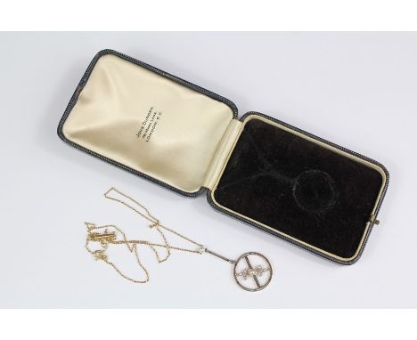 A Lady's Antique Platinum and Diamond and Seed Pearl&nbsp; Disc Pendant; on a 15 ct gold chain, approx 4.8 gms, in the origin